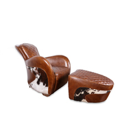 SADDLE | OCCASIONAL LEATHER COWHIDE CHAIR WITH STOOL